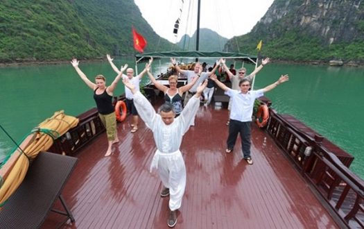 Tourist-taking-part-in-the-Tai-Chi-class-on-sundeck